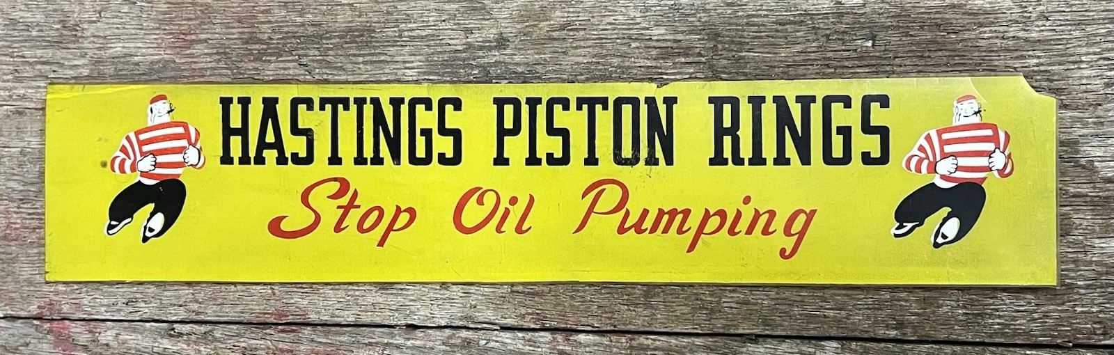 Vintage Hastings Piston Rings Dealer Advertising Sign Tough Guy Graphics 19×4
