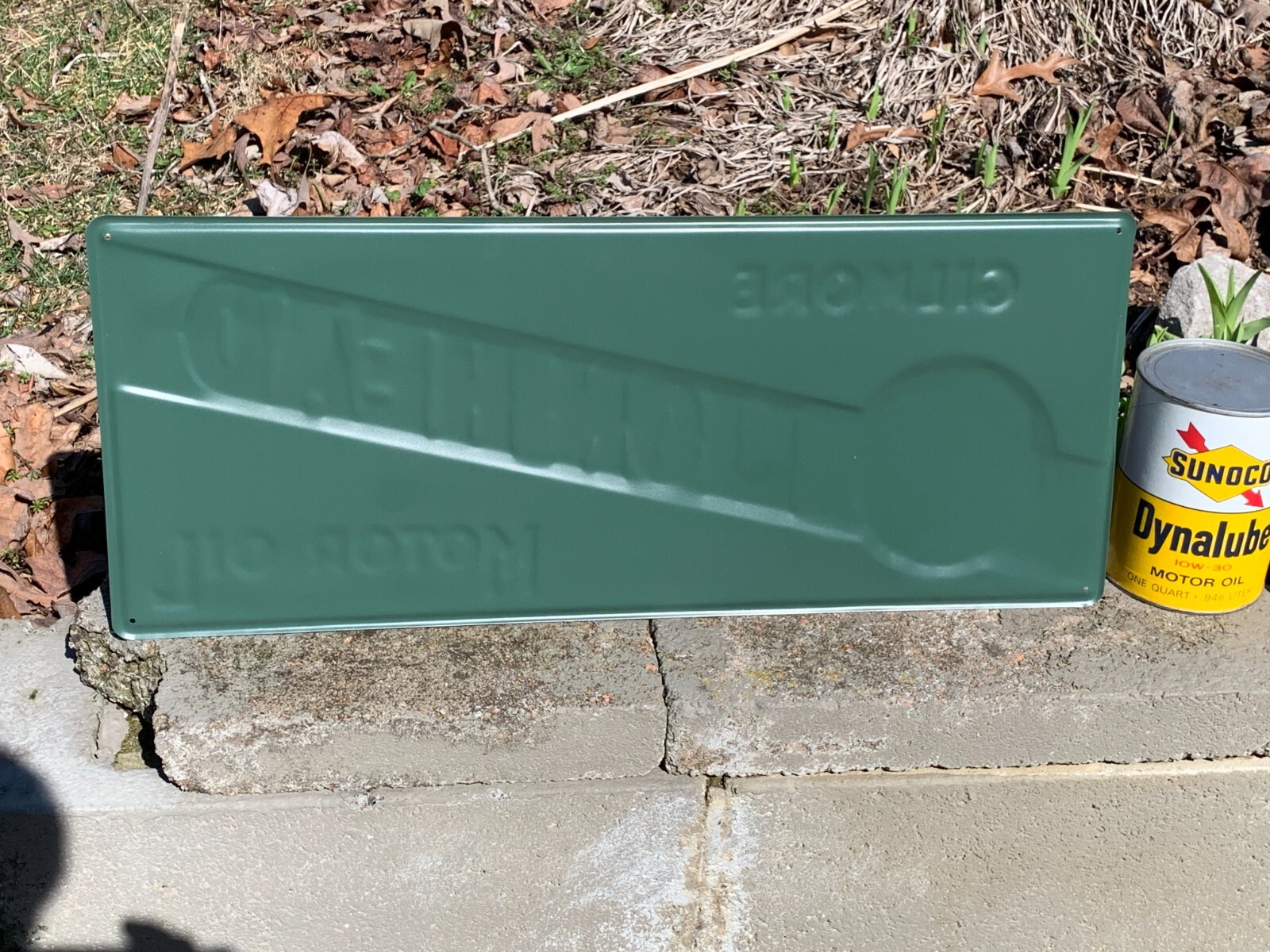 “LION HEAD MOTOR OIL” EMBOSSED METAL SIGN, (23.5″x 9.5″) EXCELLENT CONDITION