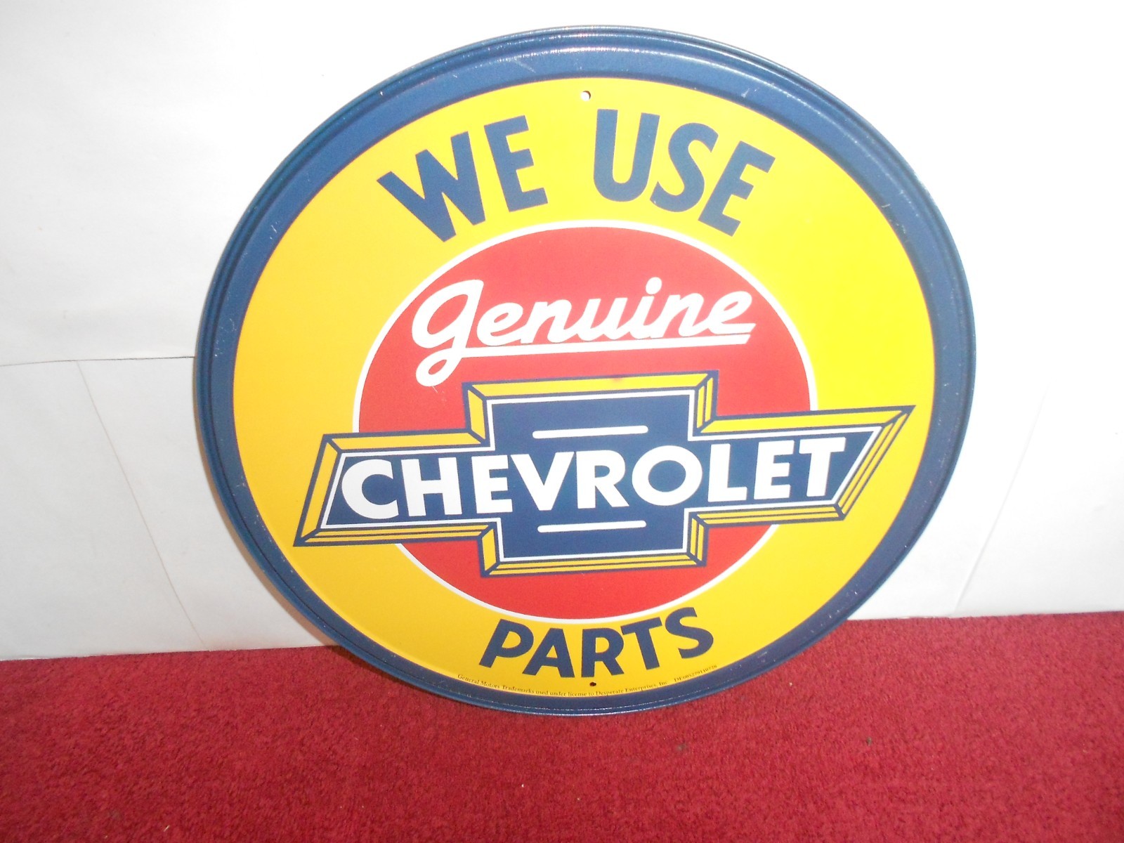 11 3/4 in CHEVY CAR & TRUCK PARTS ADV. SIGN EMBOSSED TIN METAL TACKER – S 14A