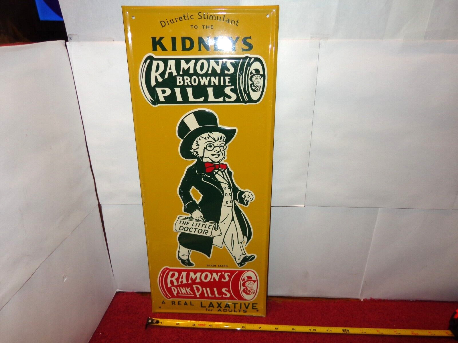 7×17 in RAMON`S LAXATIVE & KIDNEY PILLS ADV. SIGN DOMED TIN METAL TACKER – S 318