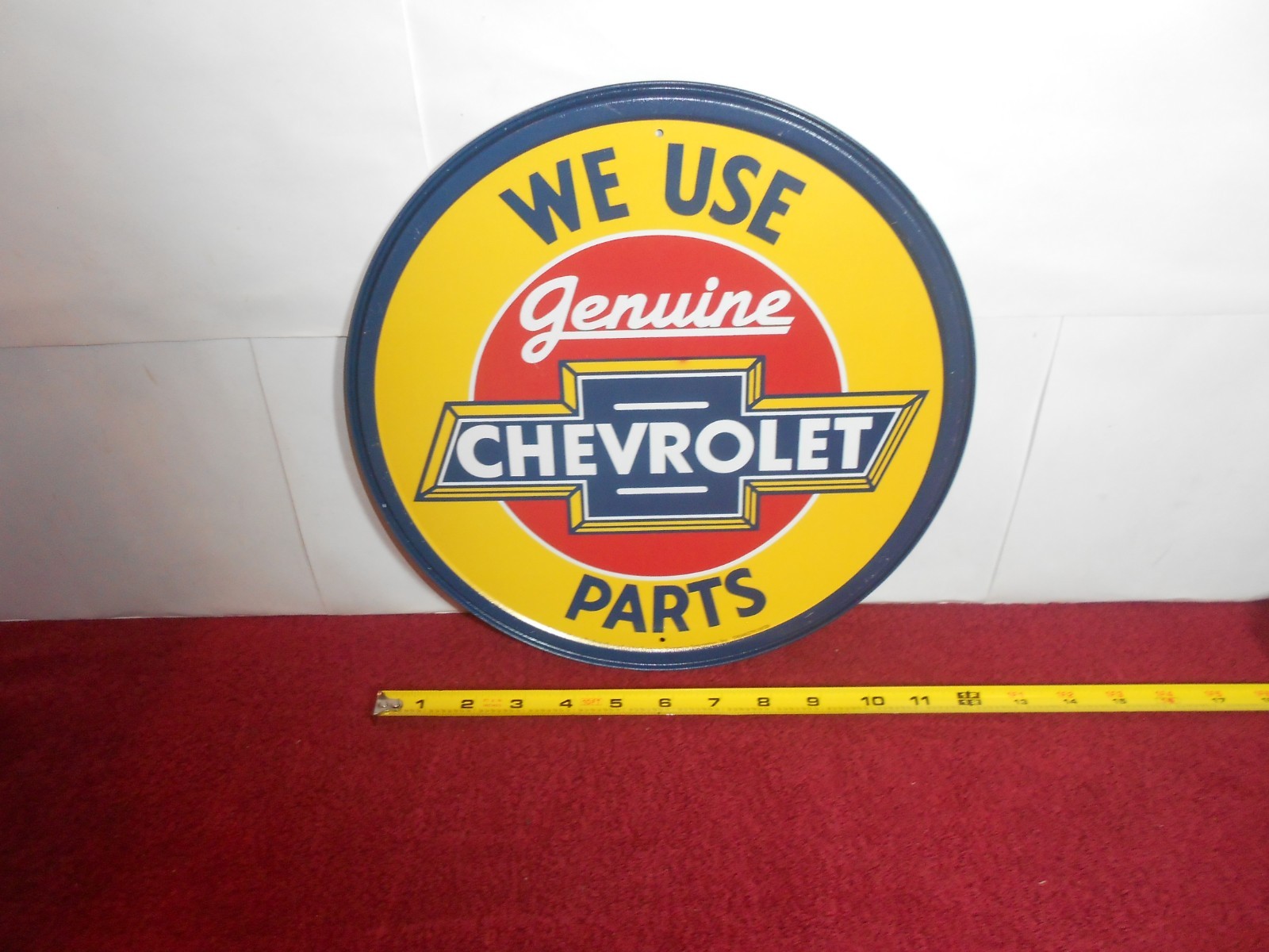 11 3/4 in CHEVY CAR & TRUCK PARTS ADV. SIGN EMBOSSED TIN METAL TACKER – S 14A