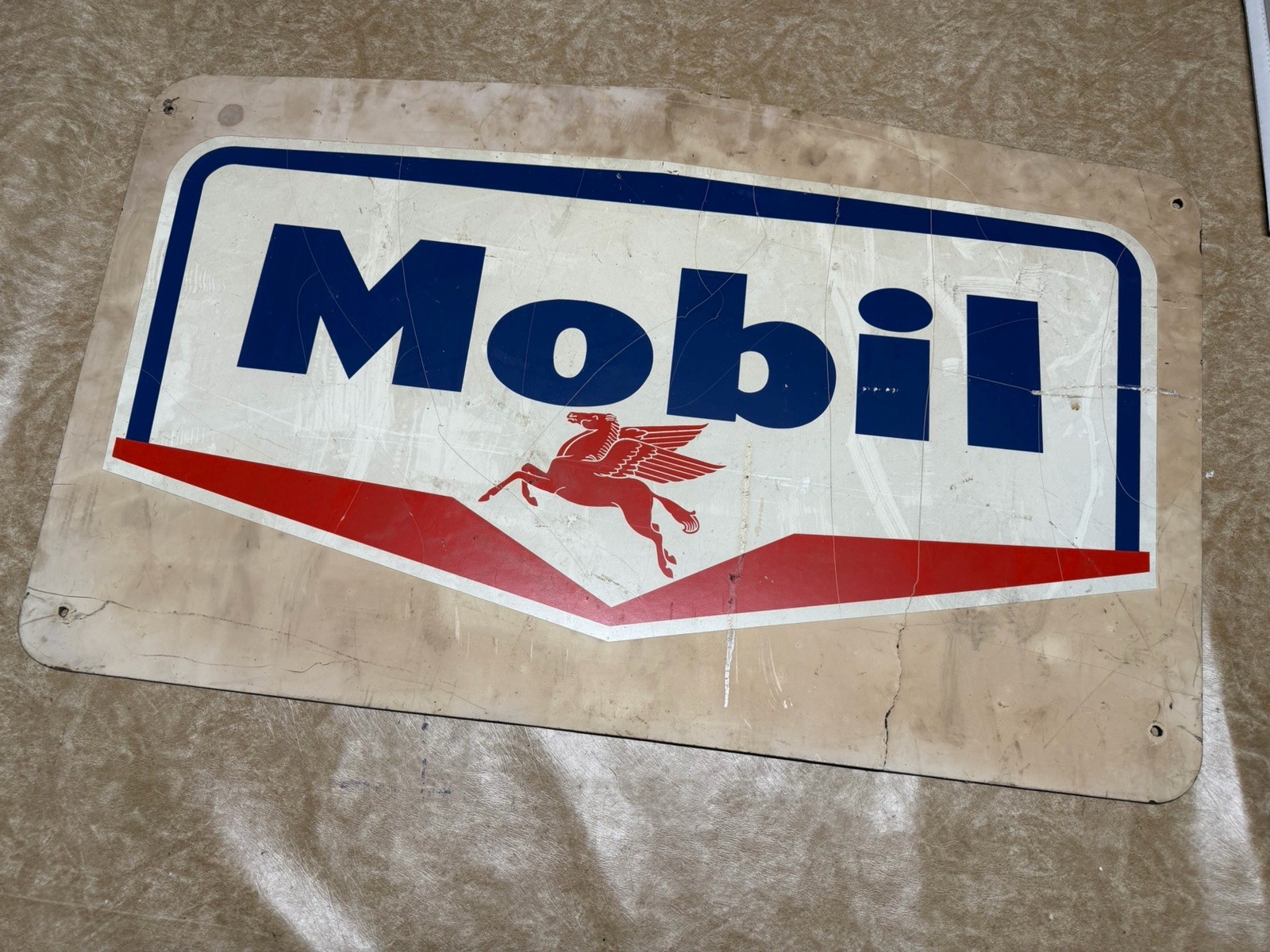 Vintage 1960s Masonite 39 x 24 Mobiloil Mobil Sign with Pegasus. Has Crack.
