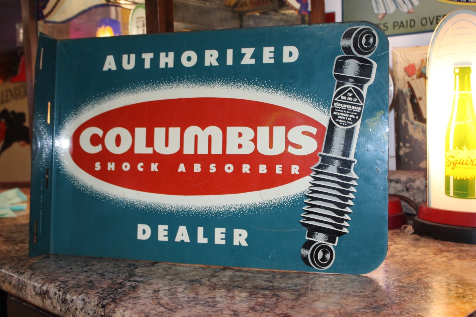 SCARCE 1950s COLUMBUS SHOCK ABSORBER DEALER 2 SIDED PAINTED METAL FLANGE SIGN 66