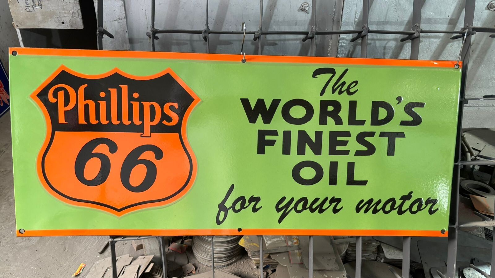 Phillips 66 World’s Finest Oil Porcelain Enamel Sign 36 x 15 Inches