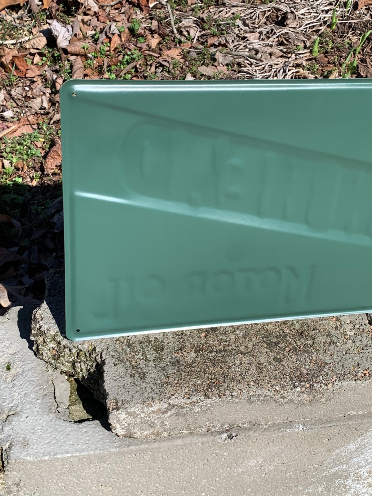 “LION HEAD MOTOR OIL” EMBOSSED METAL SIGN, (23.5″x 9.5″) EXCELLENT CONDITION