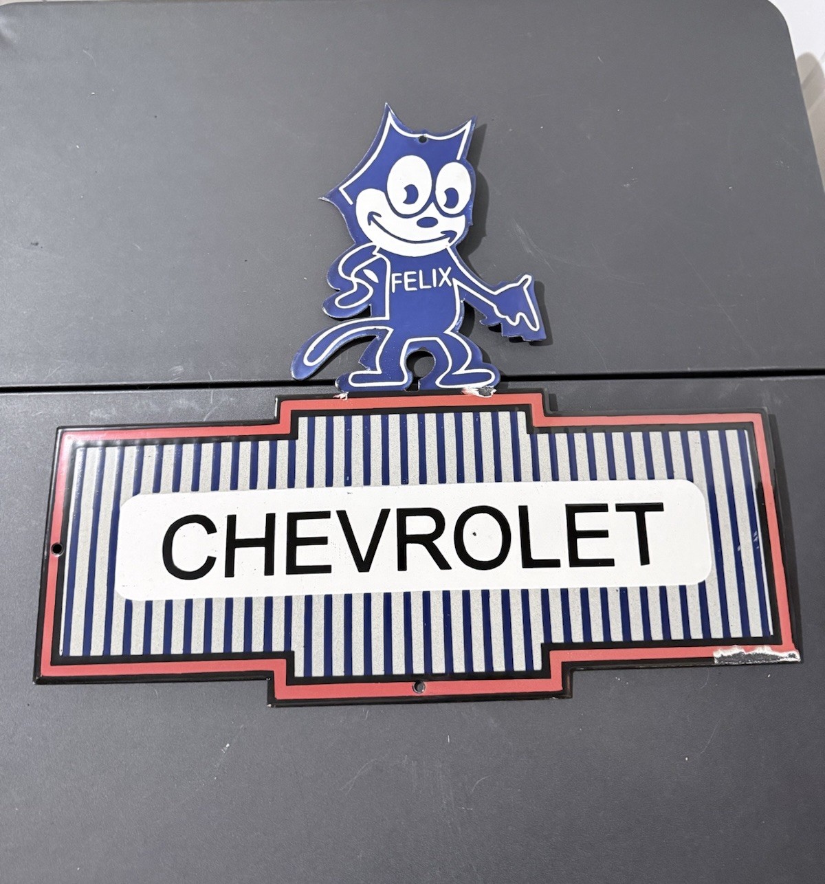 Chevrolet Porcelain Enamel 24″x 22” Single Sided Sign W/ Felix On Top