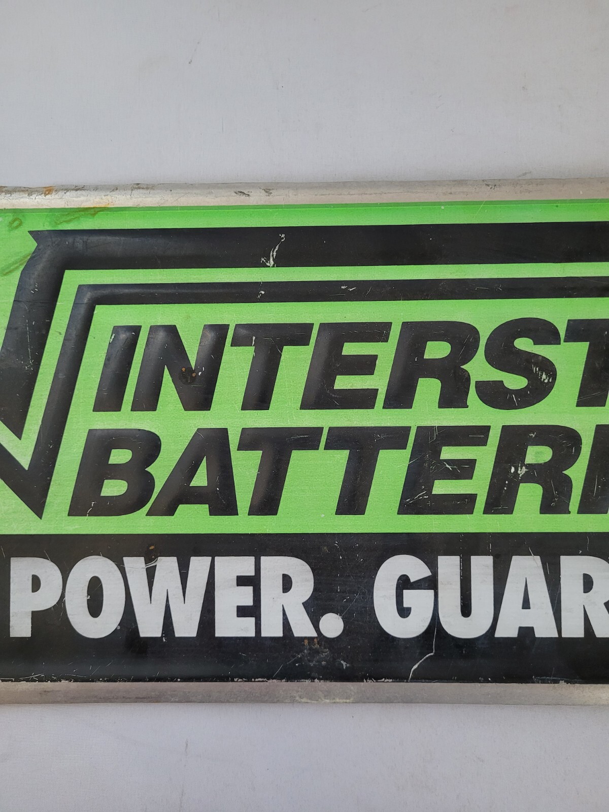 Vintage Interstate Batteries Metal Sign NFL Football Sponsor