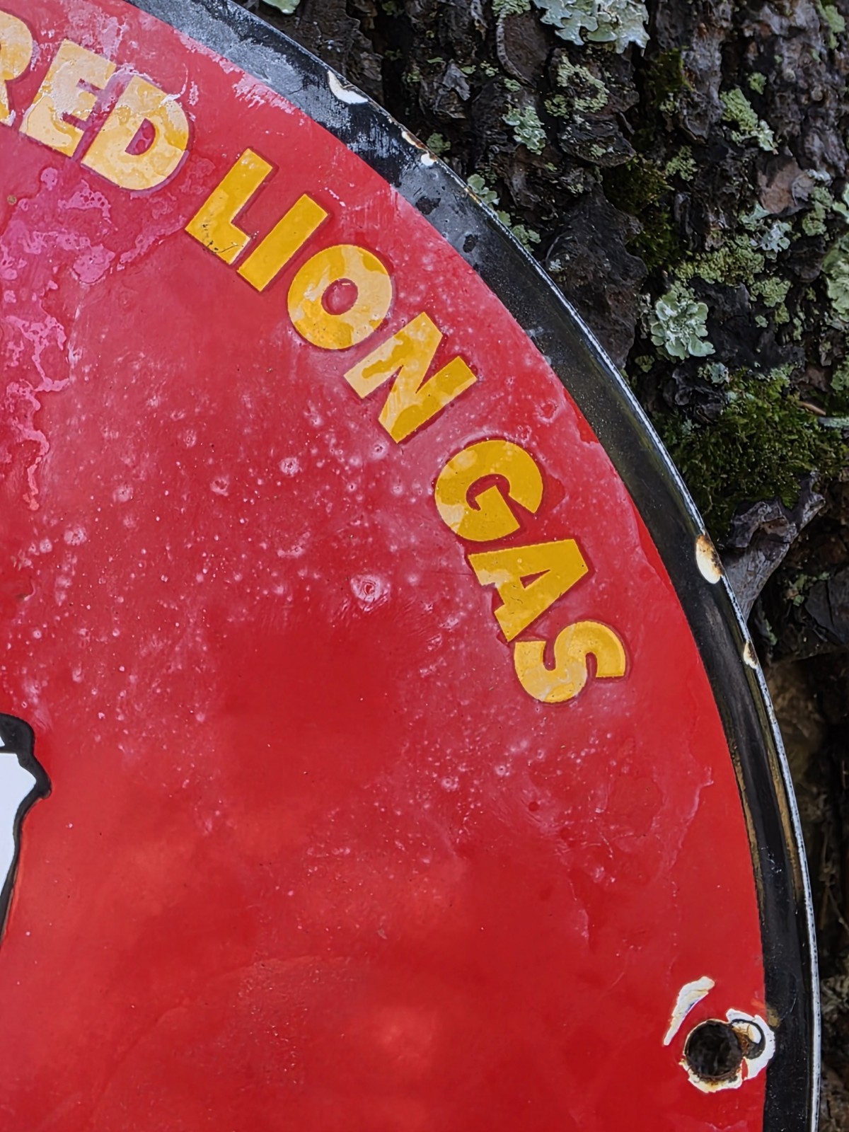 VINTAGE GILMORE PORCELAIN SIGN – YOU’LL GET A KICK OUTA RED LION GAS 12″