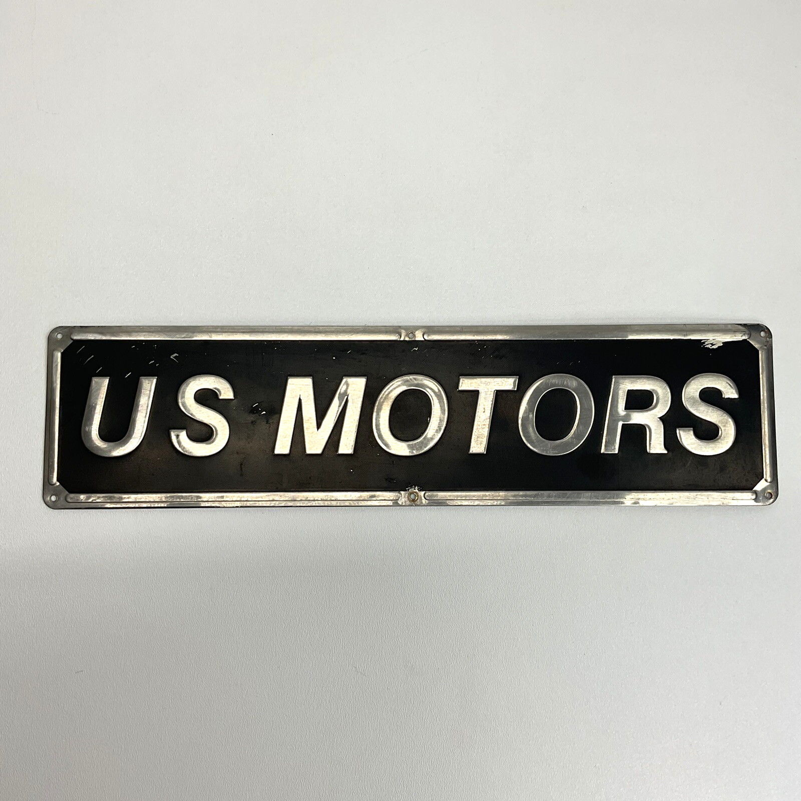US Motors Metal Sign Vintage Black & Silver 16″x4″ – Garage Man Cave Auto Decor.