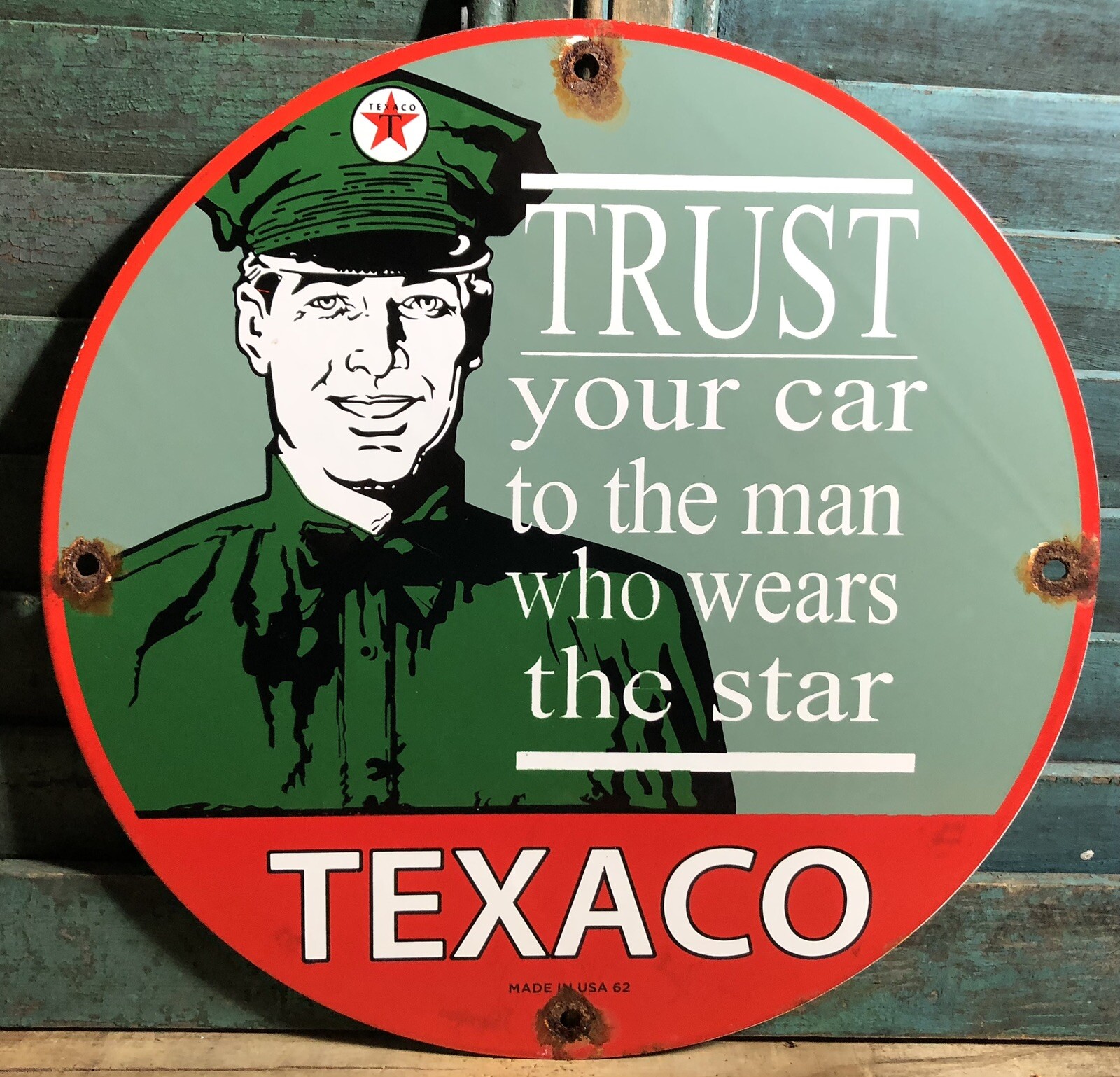 VINTAGE 1962 TEXACO TRUST YOUR CAR TO THE MAN WHO WEARS THE STAR PORCELAIN SIGN