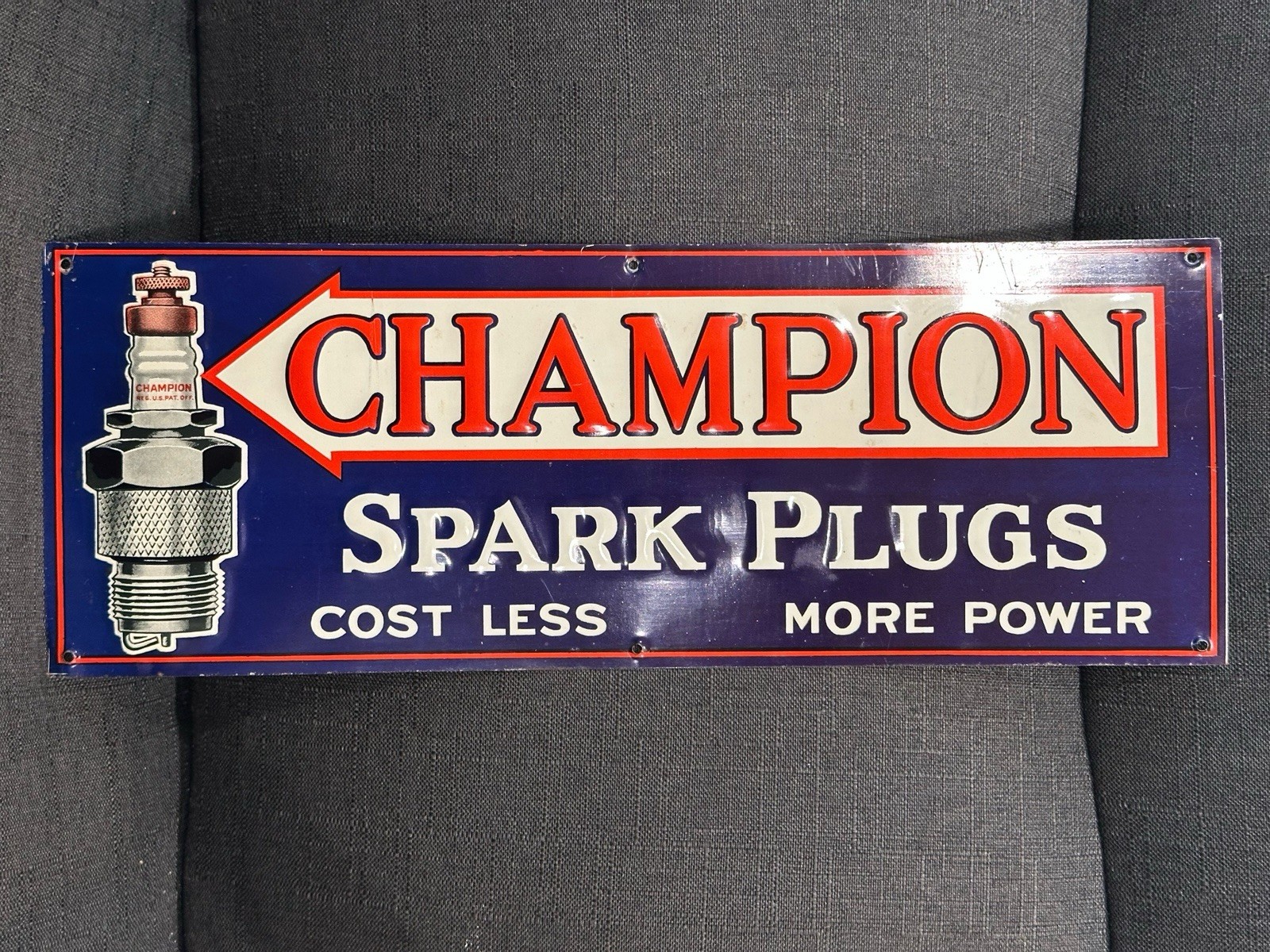 Vintage CHAMPION SPARK PLUG Tin Sign Original Rare Cost Less More Power 15×5.5”