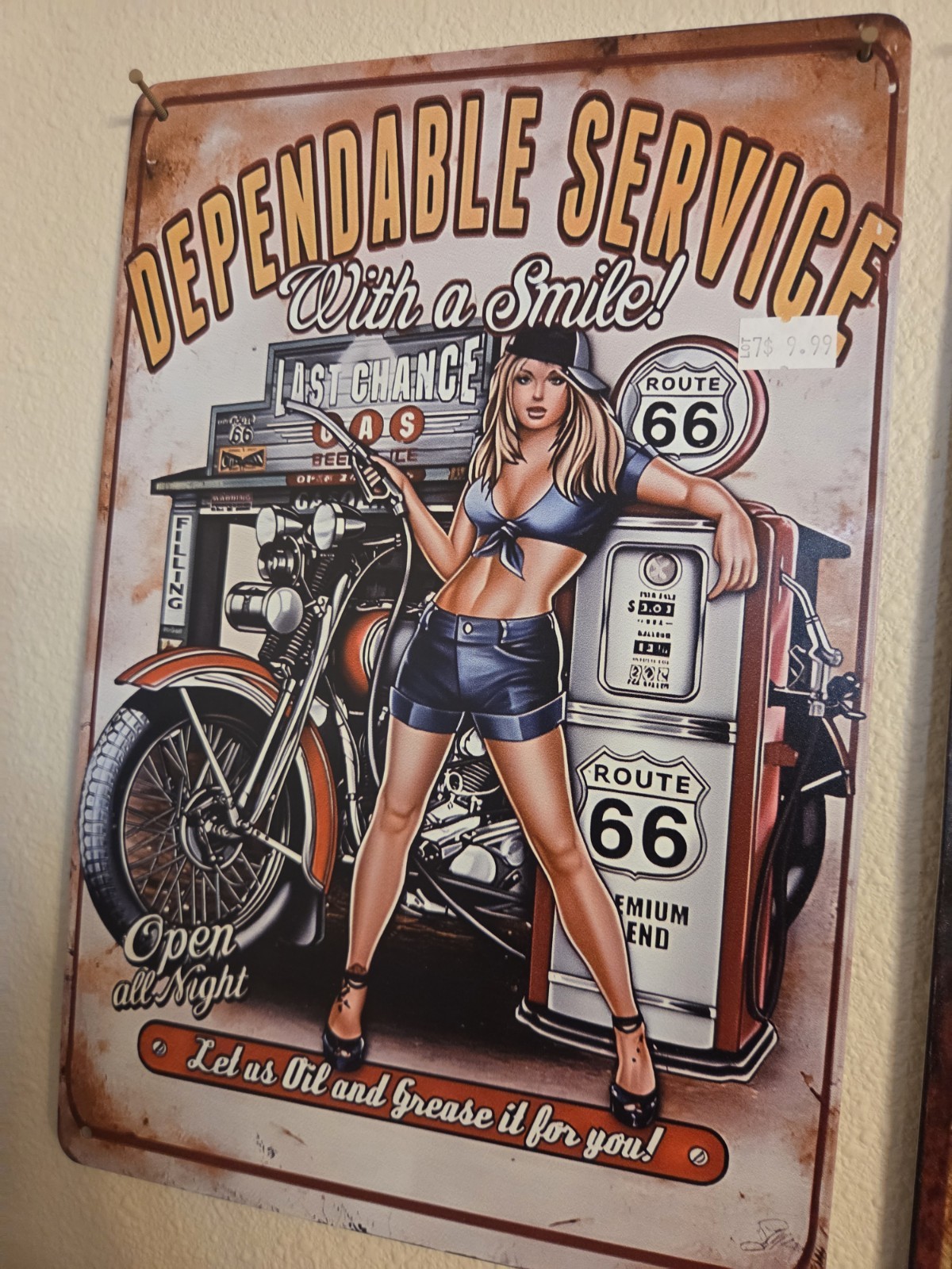 DEPENDABLE PINUP GAS & SERVICE STATION TIN SIGN.