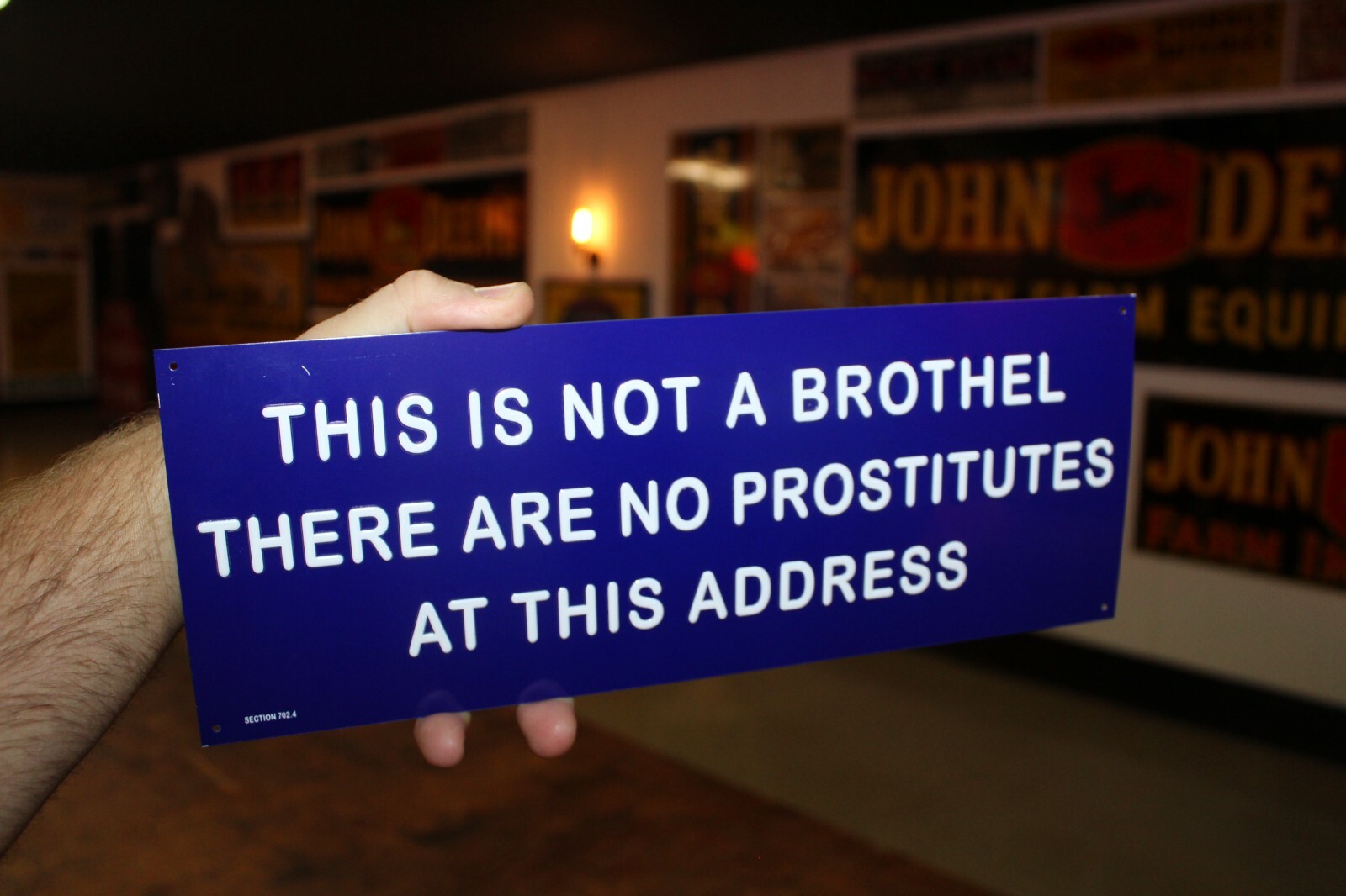 NOT A BROTHEL NO PROSTITUTES EMBOSSED METAL SIGN STRIP CLUB GAS OIL FUNNY HUMOR
