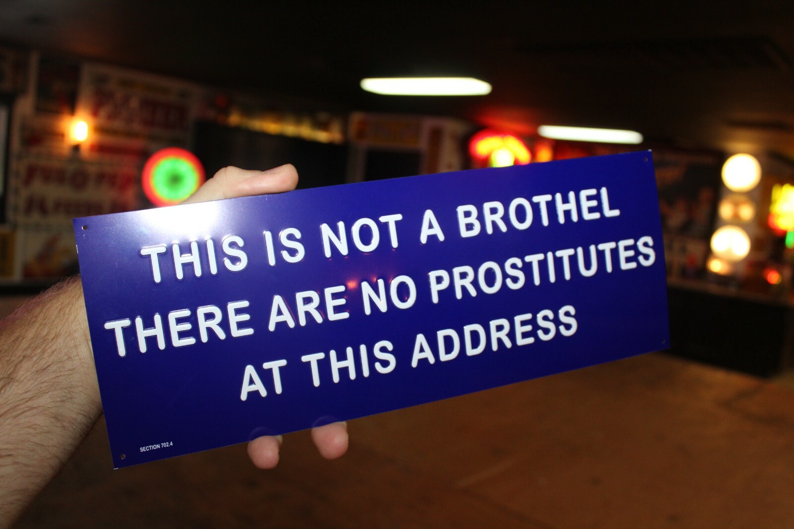NOT A BROTHEL NO PROSTITUTES EMBOSSED METAL SIGN STRIP CLUB GAS OIL FUNNY HUMOR