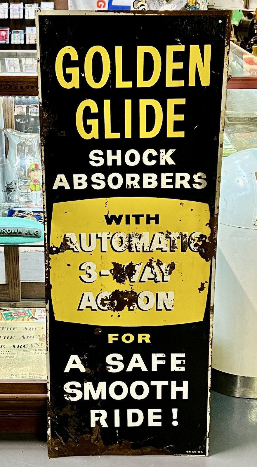 Vintage 1962 Golden Glide Shock Absorbers 18×48 Metal Sign Gas Oil Advertising