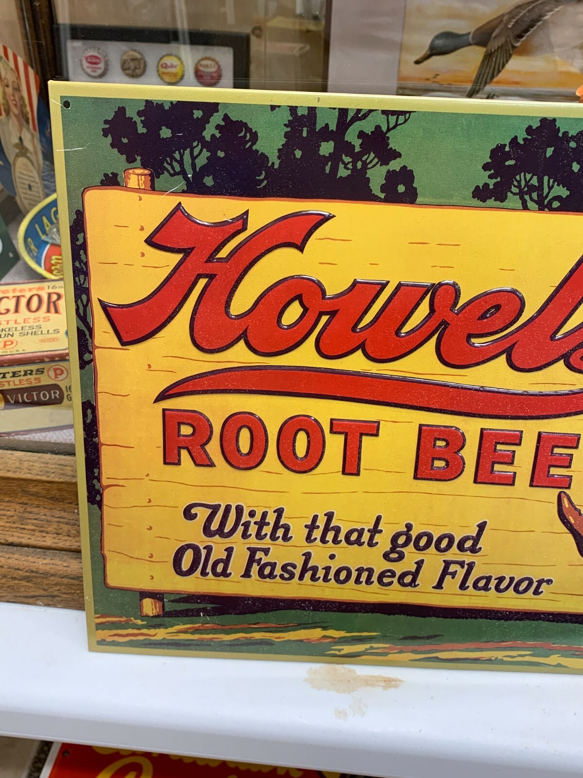 VINTAGE “HOWELL’S ROOT BEER” EMBOSSED METAL SIGN, (16.5″x 11.75″) GOOD CONDITION