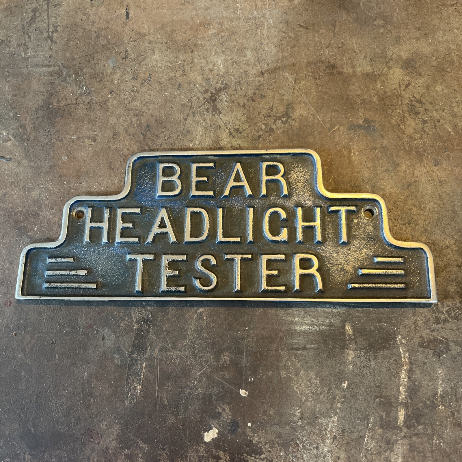 BEAR HEADLIGHT TESTER Metal Embossed Equipment Topper Sign Vintage 11” x 4-1/4”