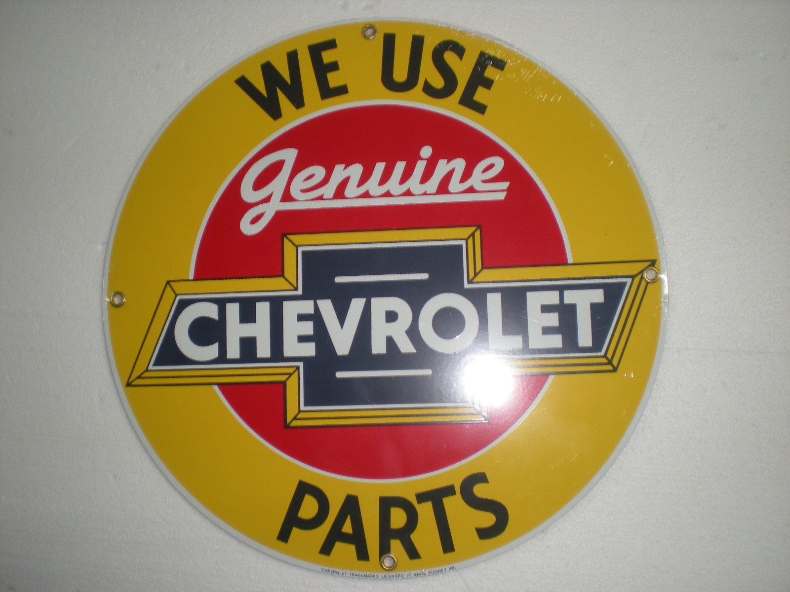 NEW “WE USE GENUINE CHEVROLET PARTS” METAL SIGN PORCELAIN 11-1/4″ ANDE ROONEY