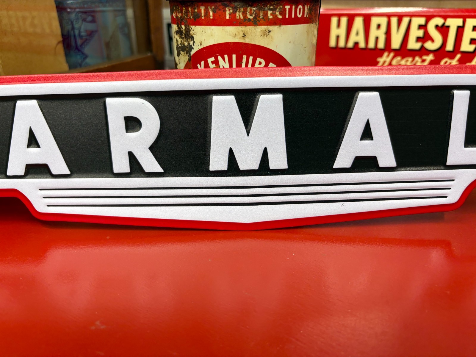 “FARMALL TRACTORS” EMBOSSED METAL SIGN, (15.5″x 3.5″) EXC CONDITION, NICE SIGN