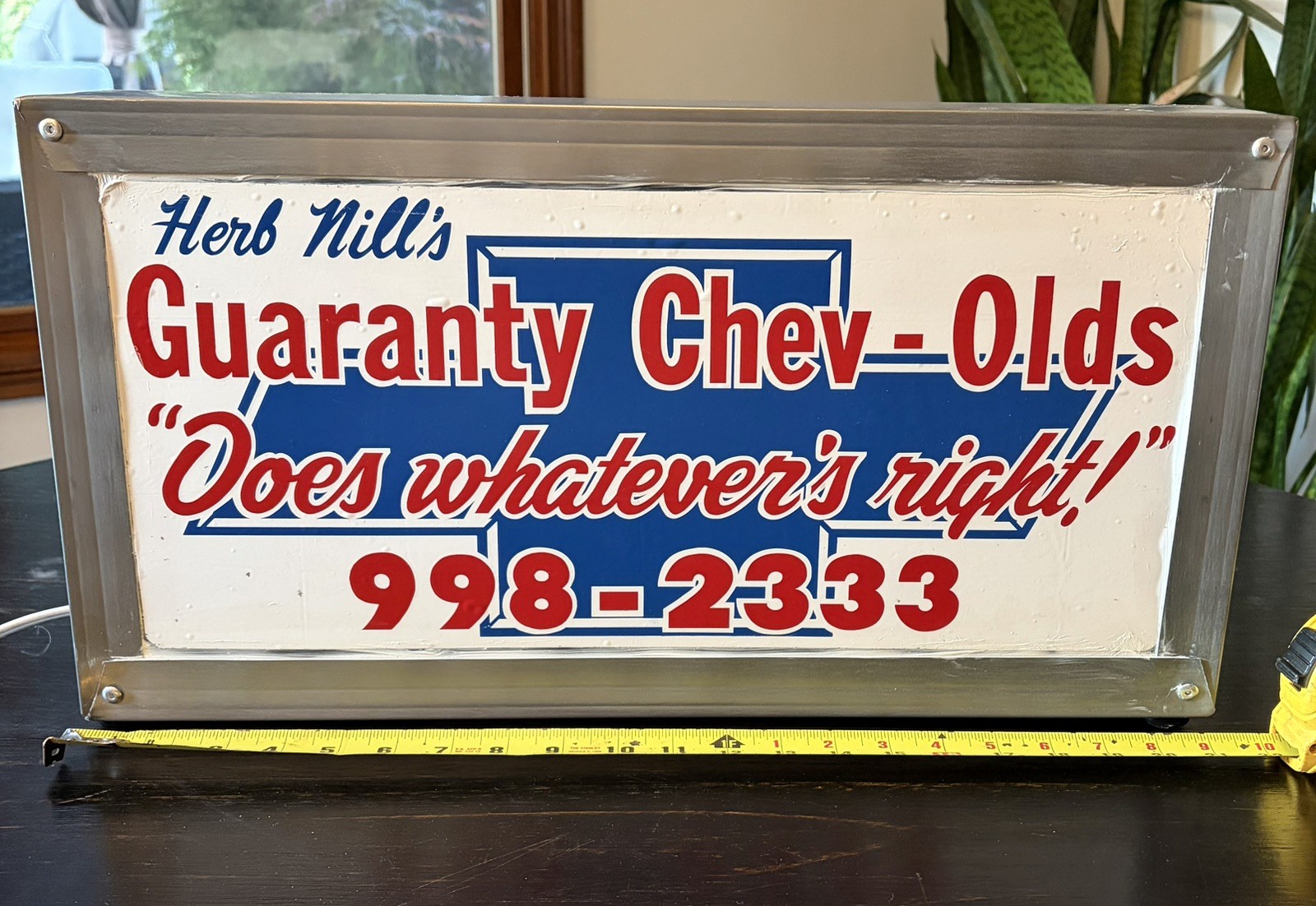 Original Vintage “Herb Nill’s Chev – Olds” dealer decal – now a Lighted Sign!
