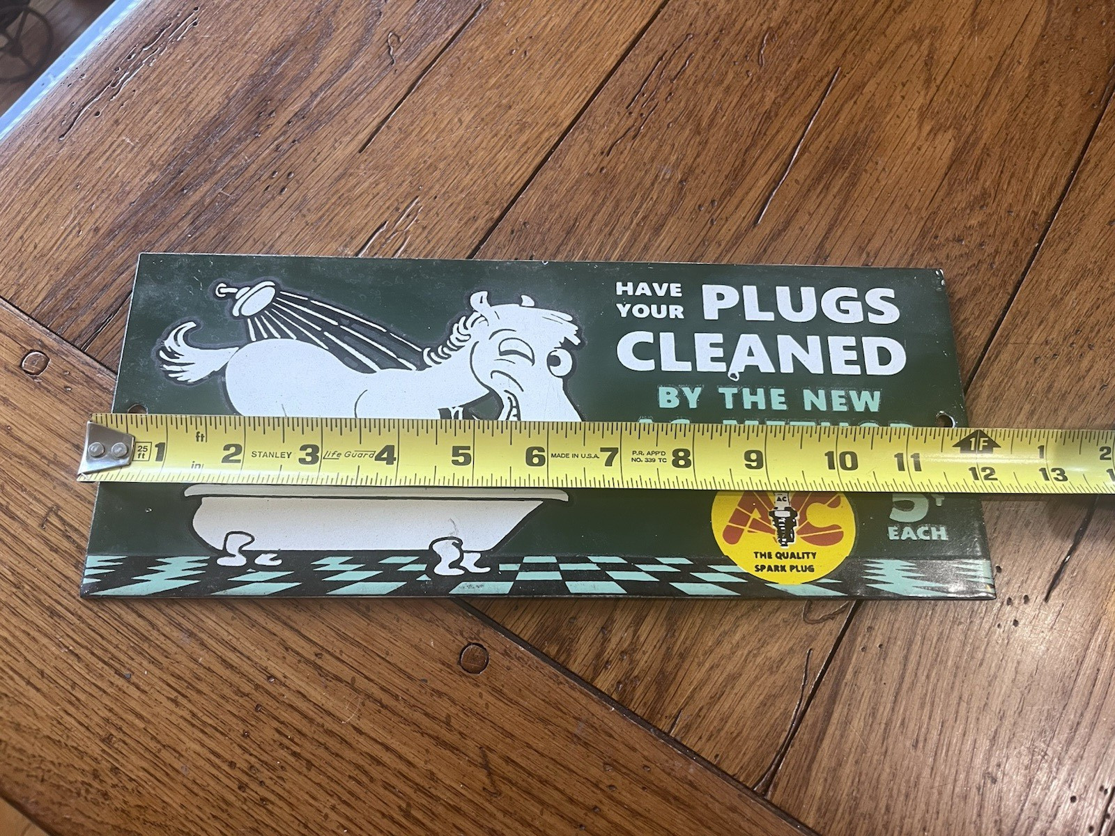 NICE AC QUALITY SPARK PLUG PORCELAIN ENAMEL SIGN 5″X12″ HAVE YOUR PLUGS CLEANED