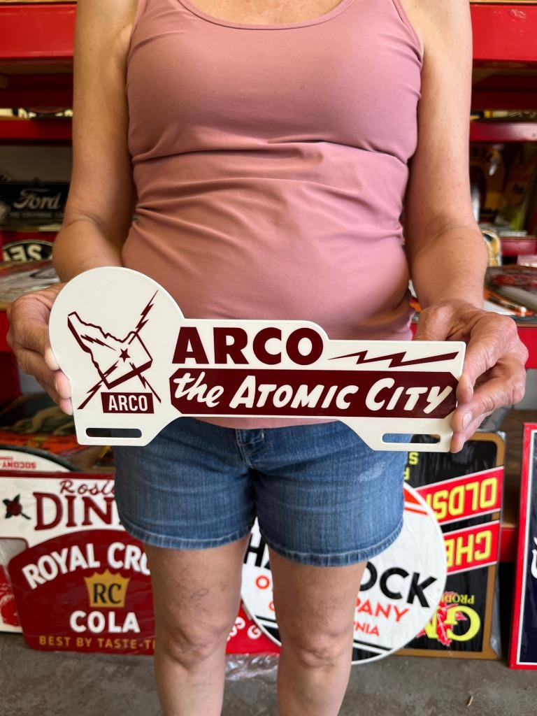 Vintage Style Metal License Plate Topper Arco Atomic City NOT Porcelain USA