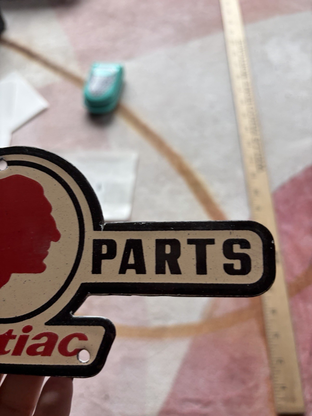 Porcelain Genuine Parts Pontiac Face Facing Right Sign