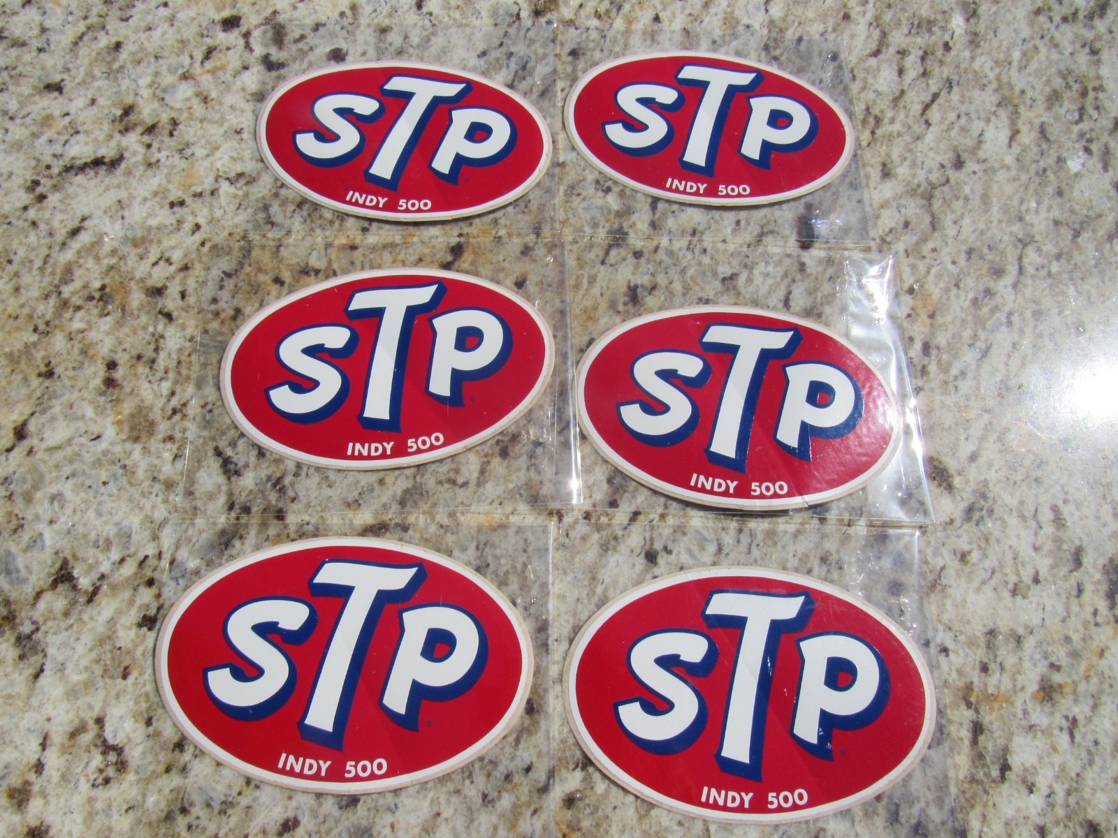 VINTAGE ORIGINAL STP INDY 500 STICKERS SIX STICKERS IN NEW OLD STOCK CONDITION