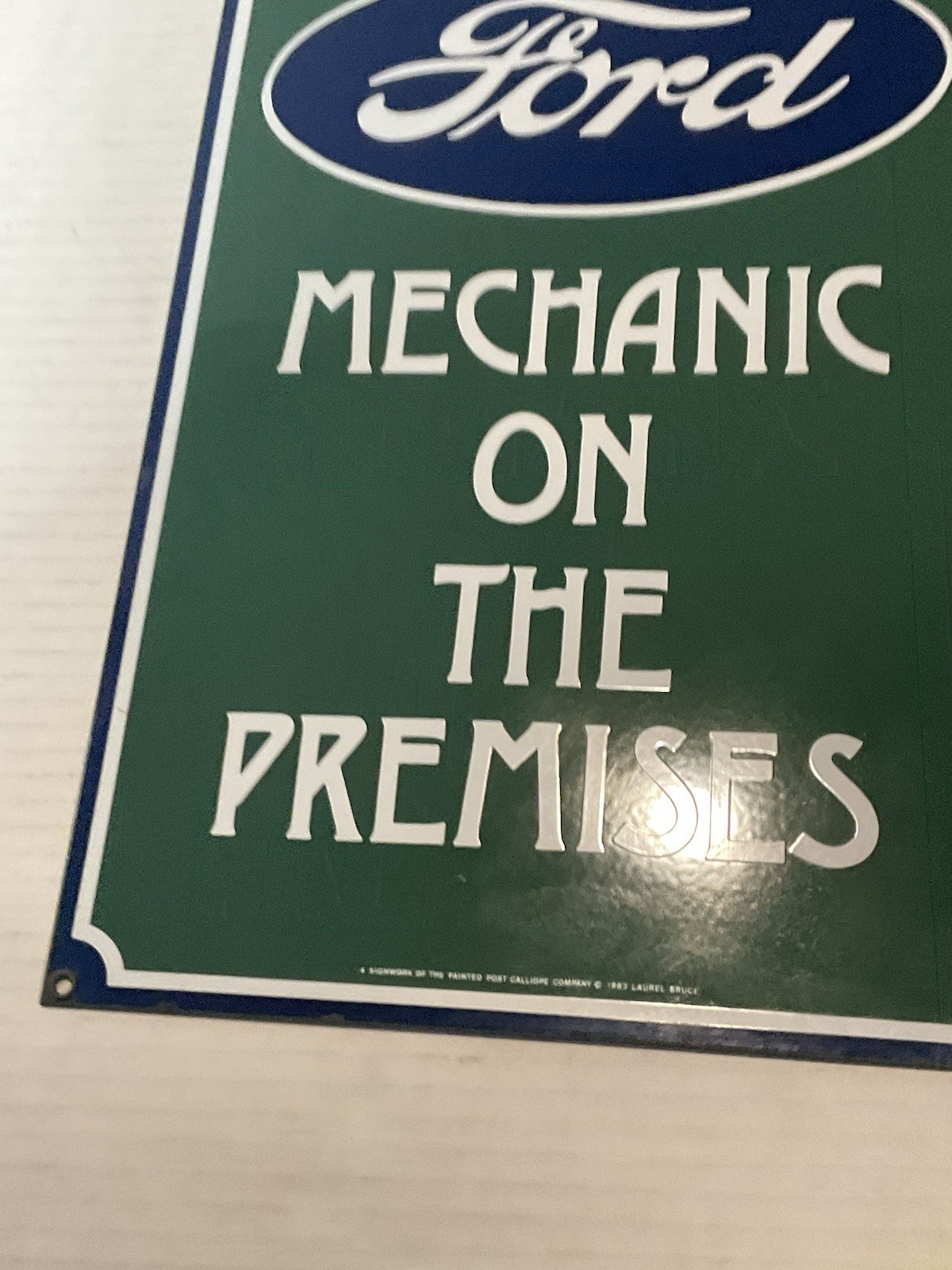 Genuine FORD Mechanic on the Premises Porcelain Sign, 1983 11″X19″ Good Cond.