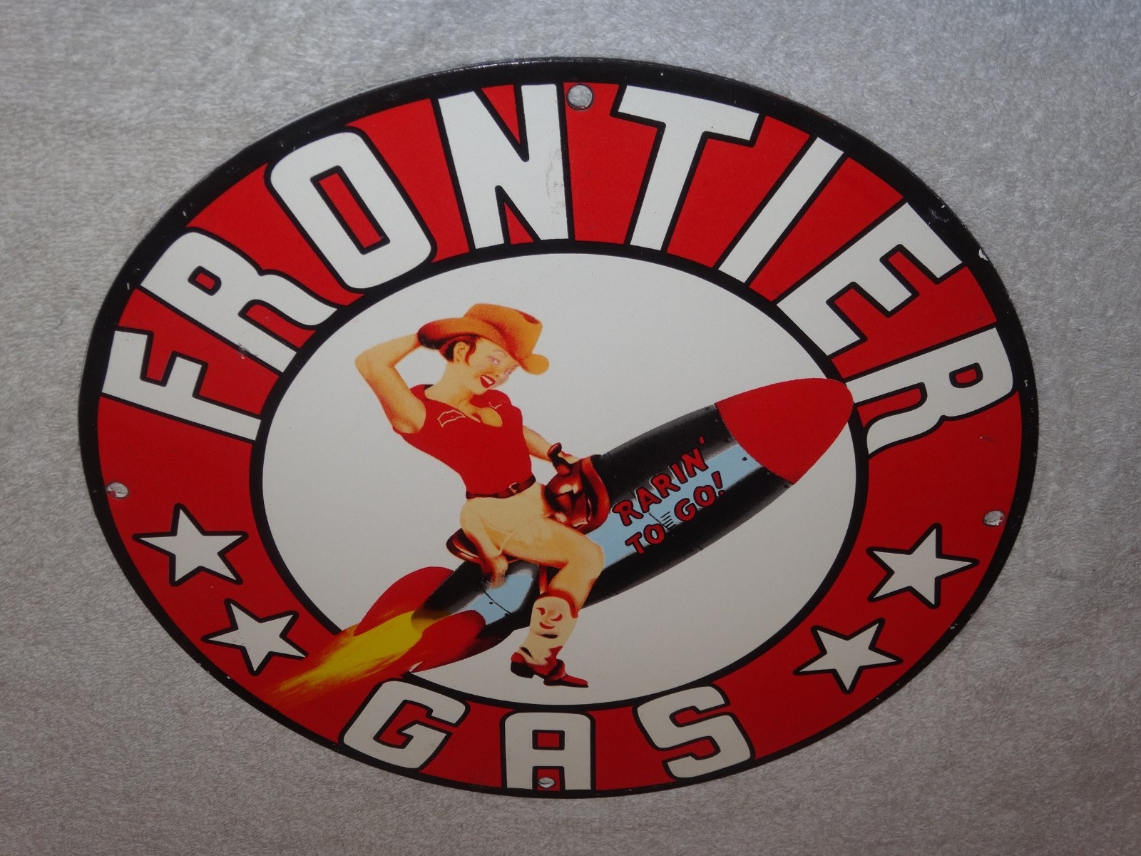 VINTAGE FRONTIER GASOLINE WOMAN ON ROCKET 11 3/4″ PORCELAIN METAL GAS & OIL SIGN