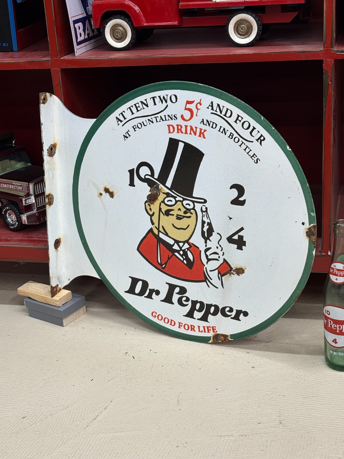 OLD “Dr PEPPER 10-2-4″ LARGE PORCELAIN FLANGE ADVERTISING SIGN, (19″x 18”) NICE