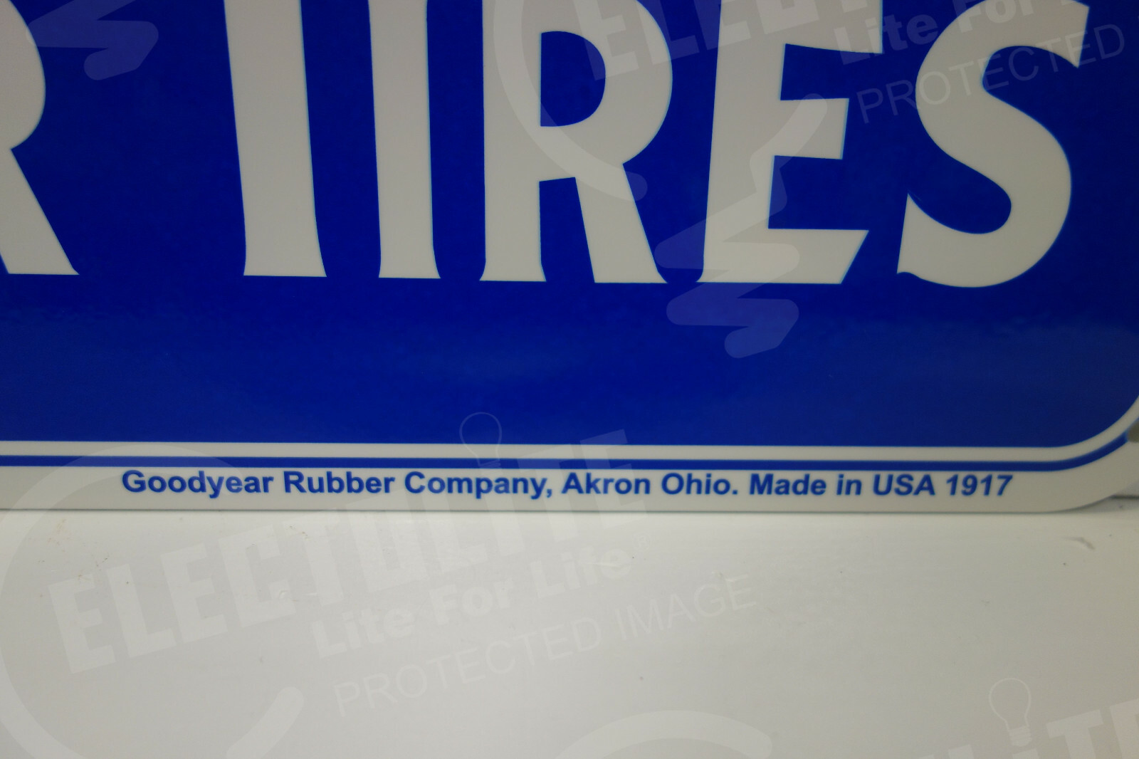 AGENCY GOODYEAR RUBBER TIRES AKRON Enamel Sign 12″ high by 18″ wide.